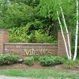 Mews neighborhood welcome sign in Bedford, NH